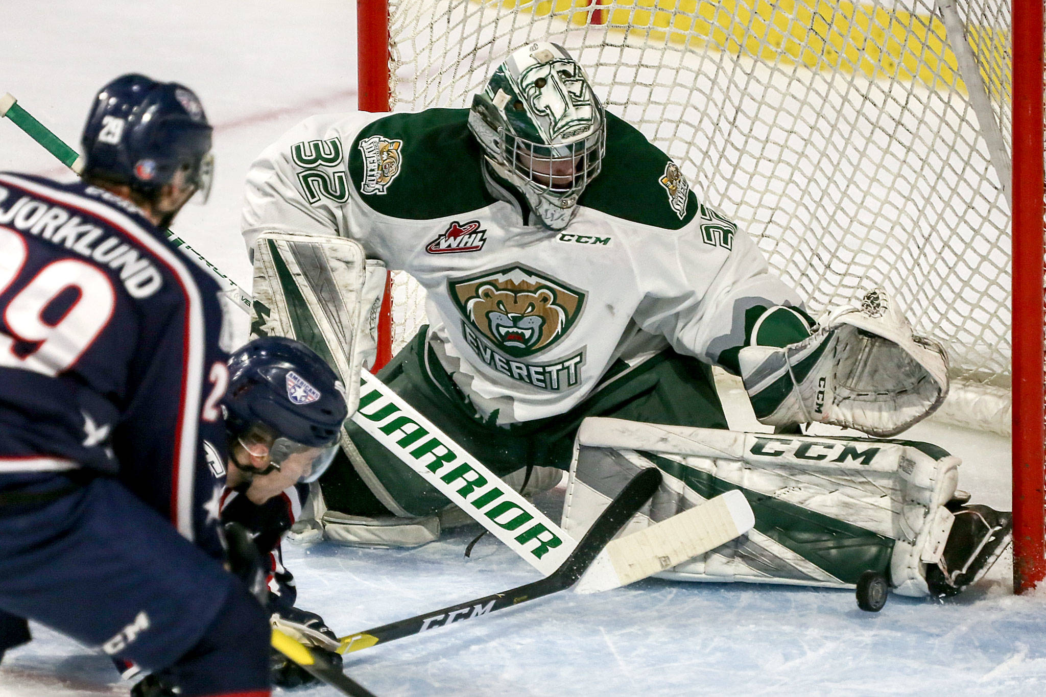 Silvertips goalie Dustin Wolf blocks a shot attempt from Tri-City’s Connor Bouchard during a playoff game on March 23, 2019, at Angel of the Winds Arena in Everett. (Kevin Clark / The Herald)