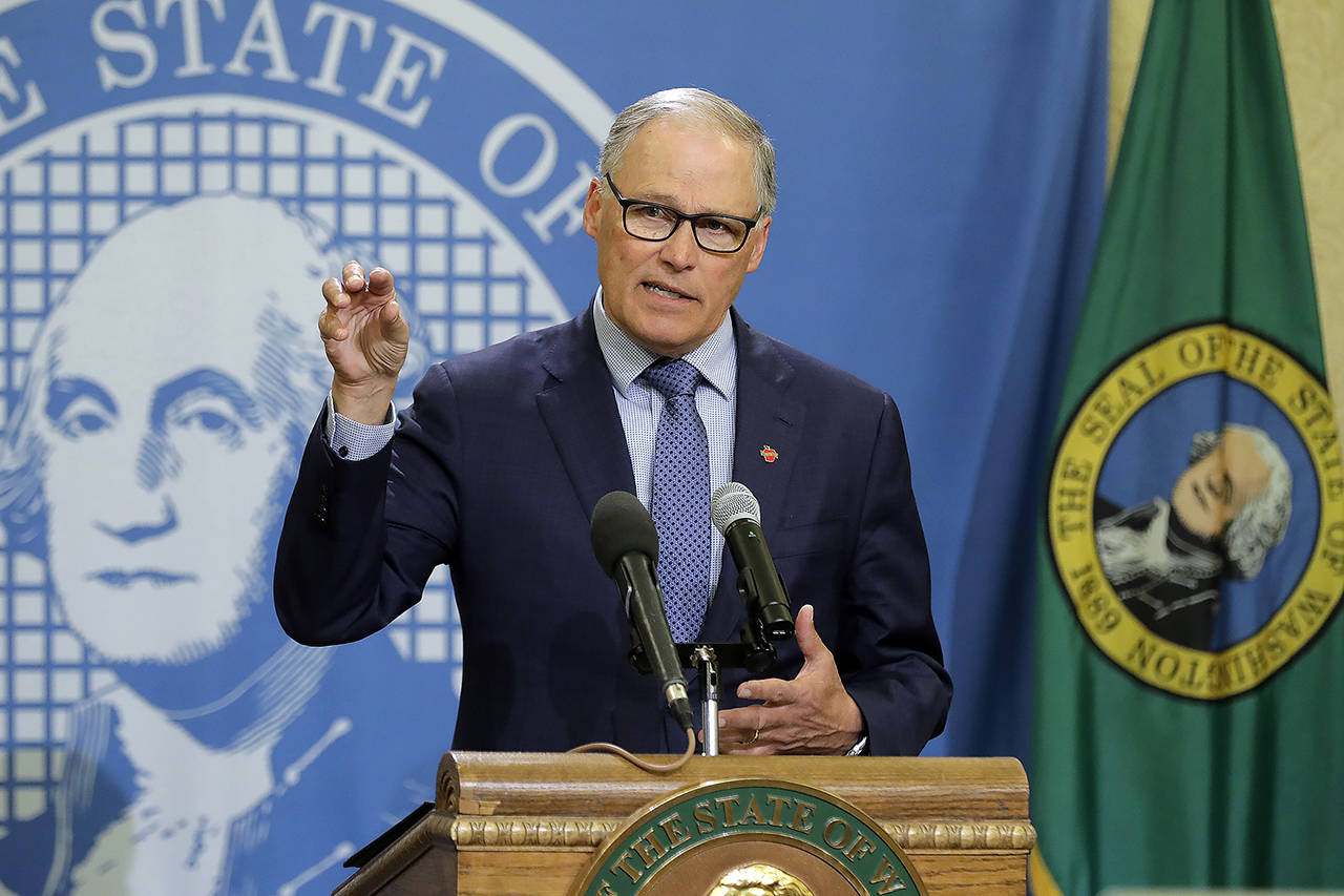 In this April 13 photo, Washington Gov. Jay Inslee speaks during a news conference at the Capitol in Olympia. (AP Photo/Ted S. Warren, File)