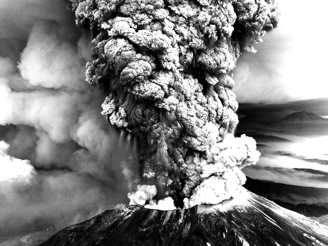 The Mount St. Helens eruption 40 years ago, on May 18, 1980, spews ash and debris skyward. The images and memories live on as enduring aspects of Northwest history. (U.S. Geological Survey photo)