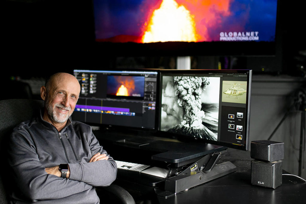 Filmmaker Michael Lienau, who was stranded on Mount St. Helens with a film crew just days after the eruption 40 years ago, shown here in his Camano Island studio. (Anna Joy photo)
