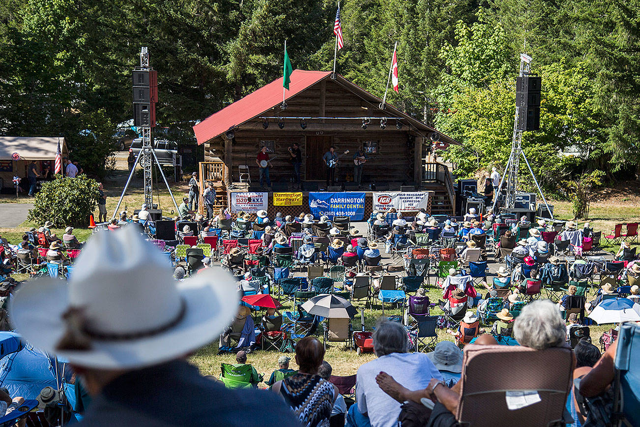 Hundreds gather at the Darrington Bluegrass Festival on Saturday, July 21, 2018 in Darrington, Wa. (Olivia Vanni / The Herald)