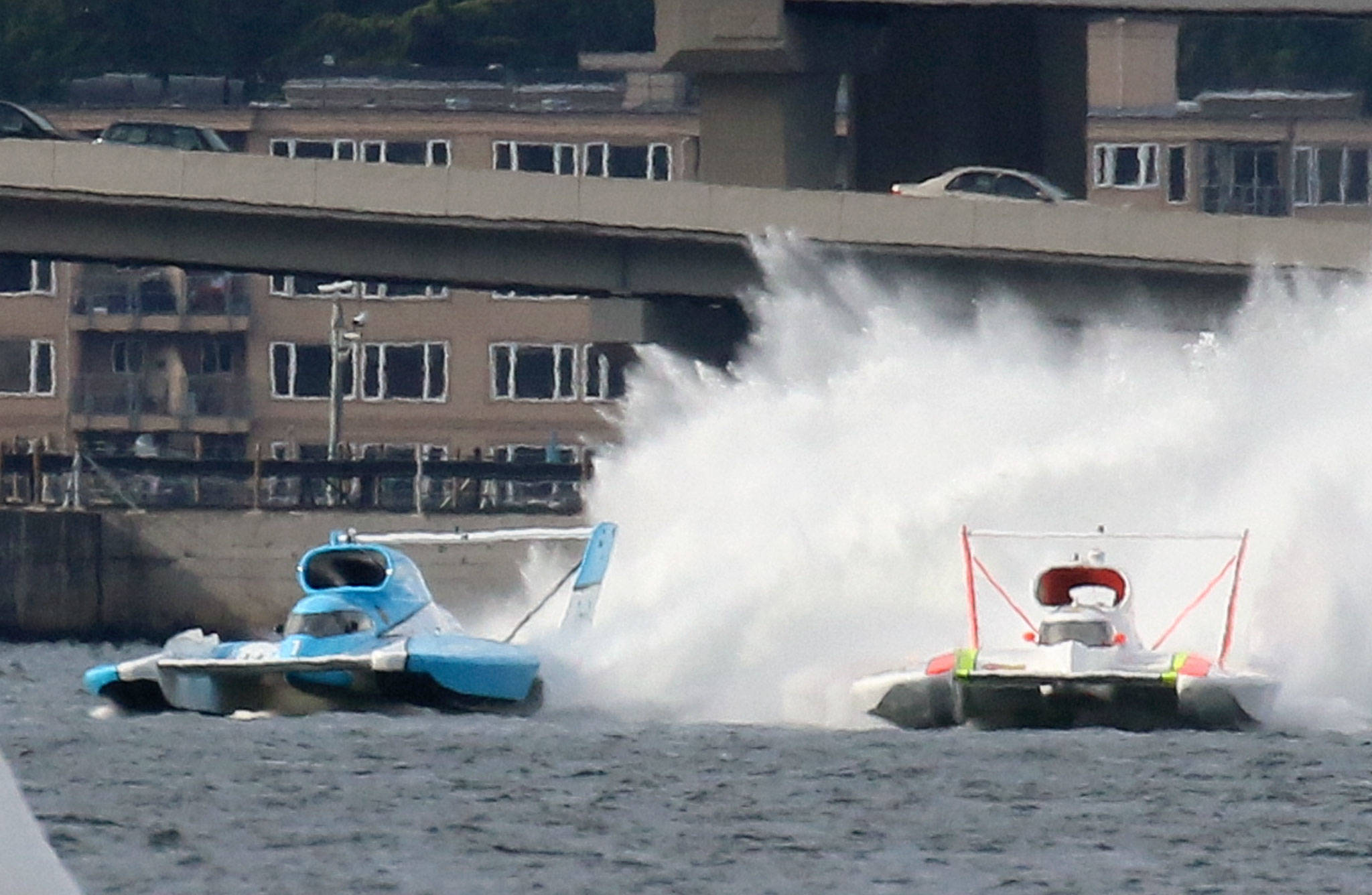 U-1 Miss HomeStreet driven by Jimmy Shane, left, and U-9 Sound Propeller Services Presents Les Schwab Tires driven by Andrew Tate race during the Seafair Hydroplane race Sunday afternoon in Seattle on August 7, 2016. (Kevin Clark / The Daily Herald)