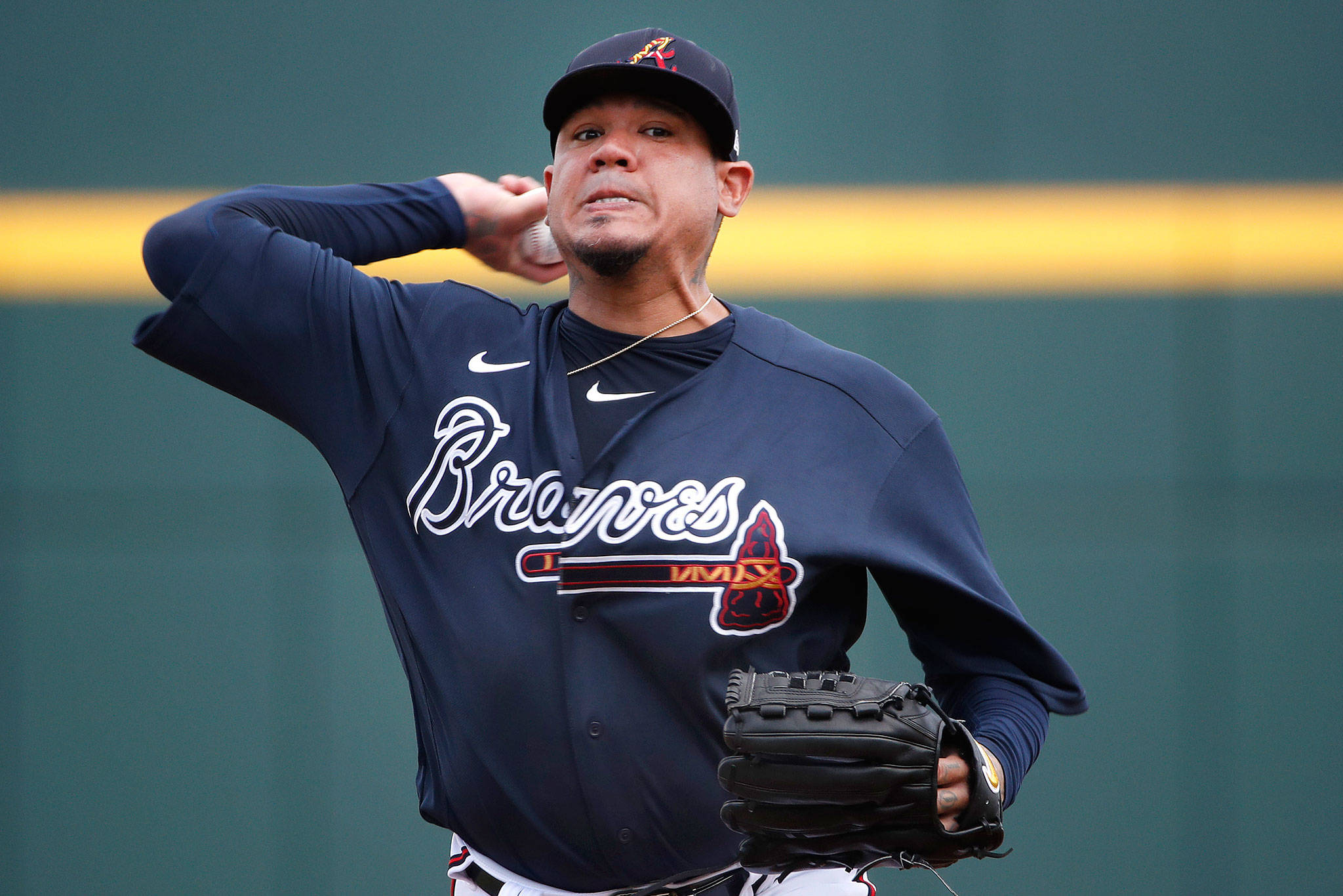 Braves starting pitcher Felix Hernandez warms up before a spring training game against the Rays on March 3 in Venice, Florida. (Associated Press)