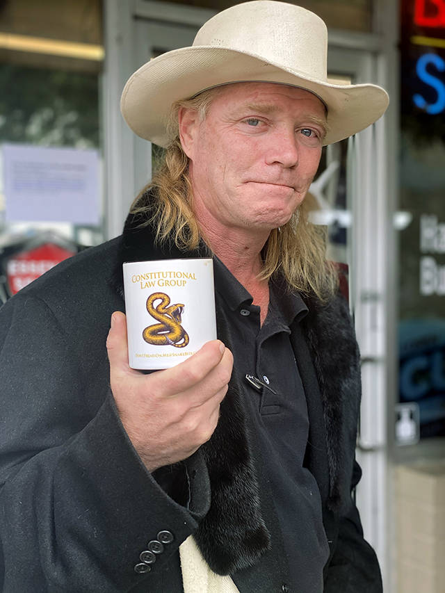 Self-described “constitutional lawyer” Rick Martin drove to Snohomish from Texas to support a barber who’s defying Washington’s stay-home order. (Andrea Brown / The Herald)