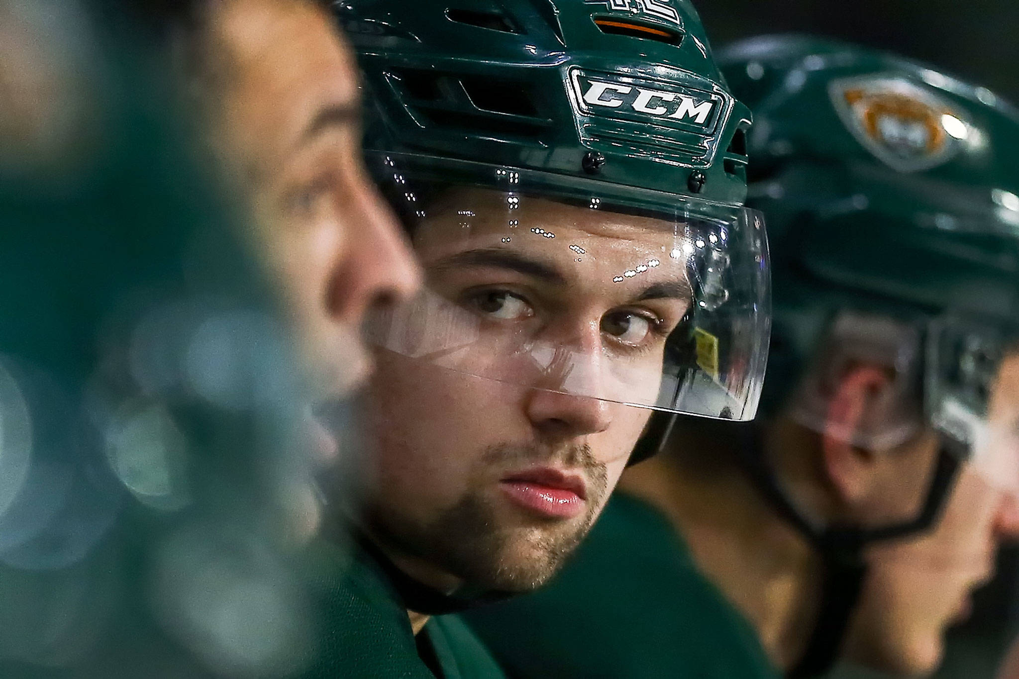 The Silvertips’ Cole Fonstad sits on the bench during practice Oct. 15, 2019, at Angel of the Winds Arena in Everett. (Kevin Clark / The Herald)