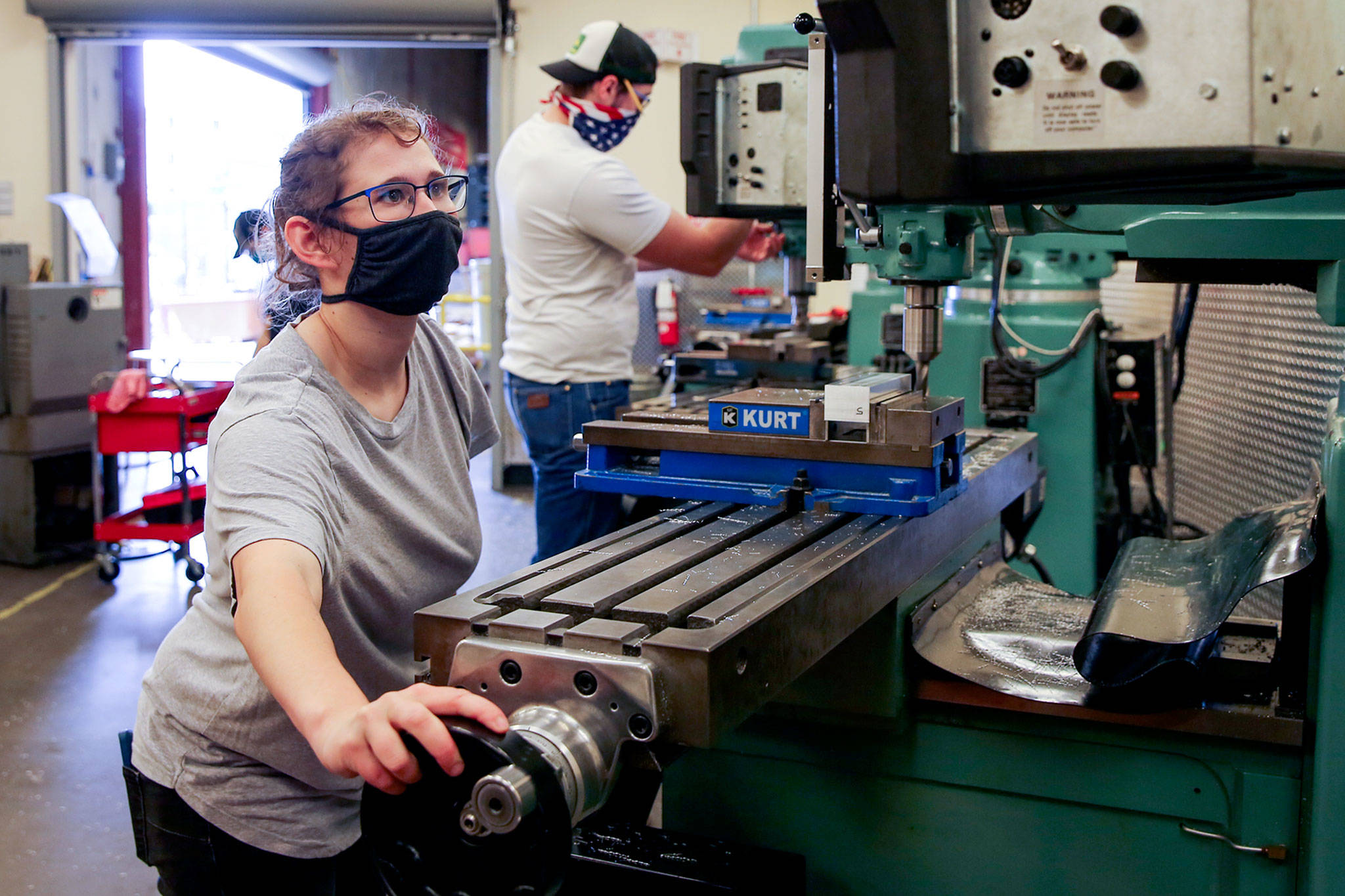 Pamela Propeck works on an assignment at the Advanced Manufacturing Training & Education Center at Everett Community College. (Kevin Clark / The Herald)