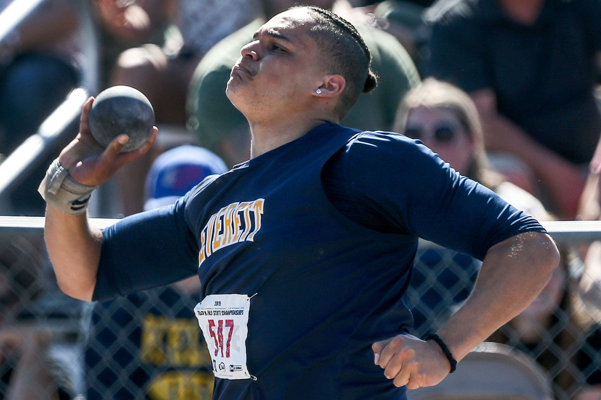 Everett’s Jayden White launches the shot during the state track and field meet on May 23, 2019, at Mount Tahoma High School in Tacoma. (Kevin Clark / The Herald)