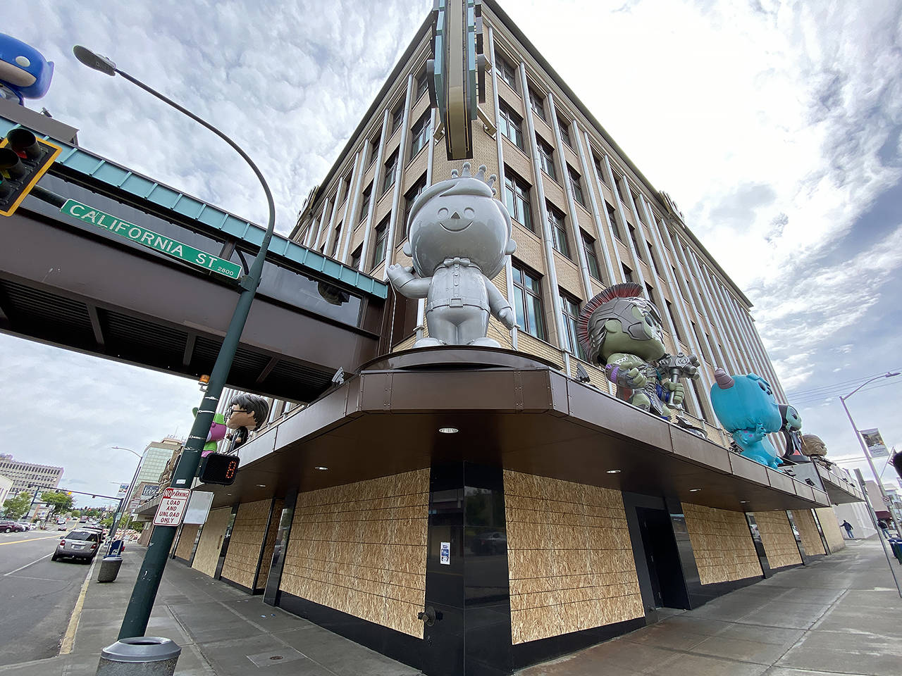 In downtown Everett, Funko, seen here Wednesday afternoon, and several other storefronts have boarded up their windows. (Sue Misao / The Herald)