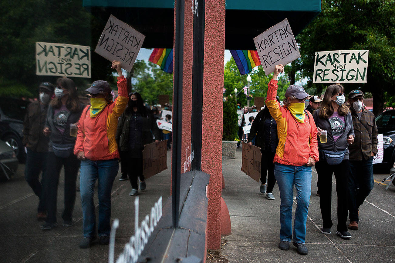 100 armed vigilantes rouse fear, soul-searching in Snohomish