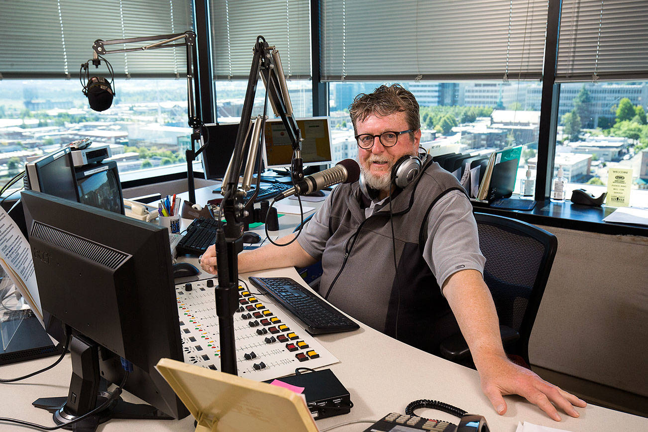 Tom Lafferty in the booth at KRKO on Thursday, July 12, 2018 in Everett, Wa. KRKO 1380 AM is switching away from a sports talk format to music after 16 years, though the station will continue to broadcast local sports events. (Andy Bronson / The Herald)