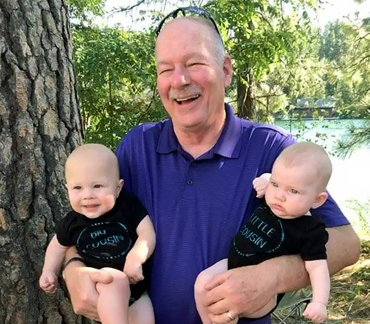 After 43 years teaching in the Everett School District, Gregg Elder is retiring to spend time with his family, including these two grandchildren. (Photo courtesy of Gregg Elder)