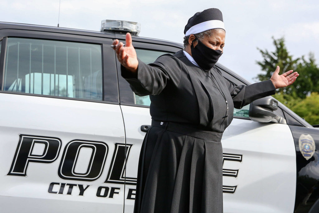 Rose Green prays during the community prayer vigil at Jubilee Church of God in Christ in Everett on Friday afternoon June 12, 2020. (Kevin Clark / The Herald)
