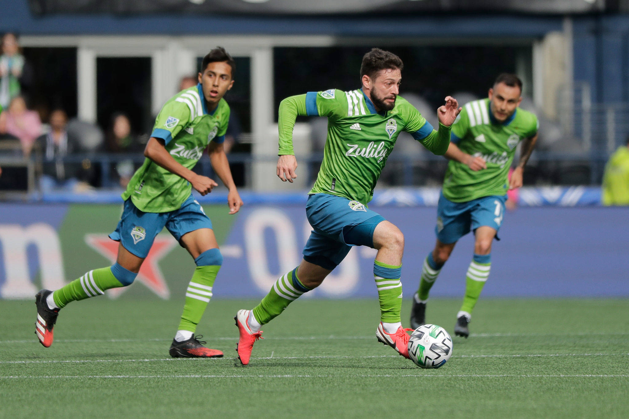 Sounders midfielder Joao Paulo (center) drives the ball during an MLS match against the Chicago Fire March 1, 2020, in Seattle. (AP Photo/Ted S. Warren)