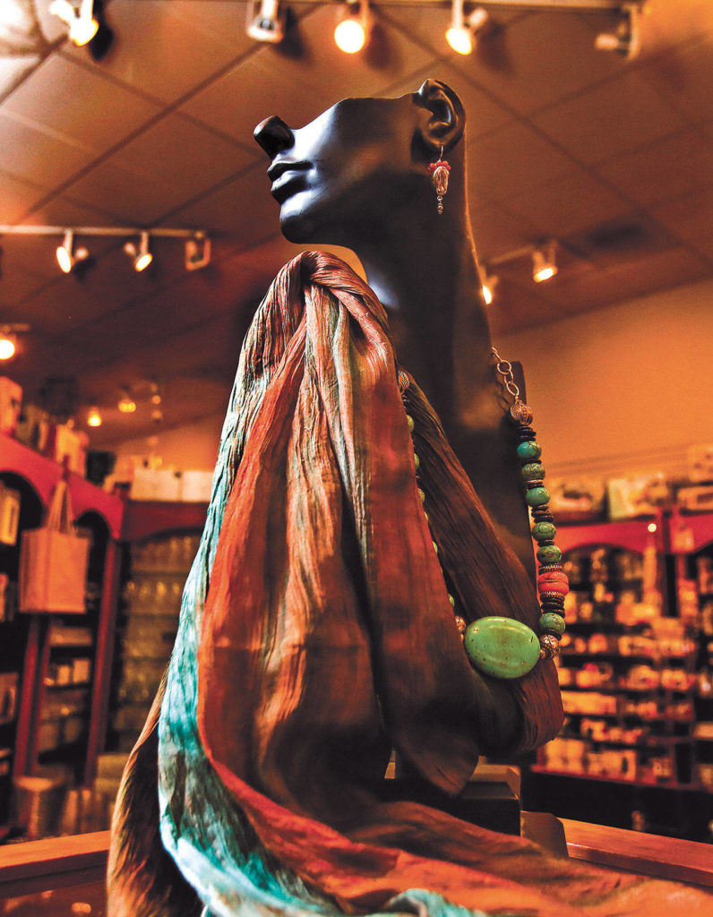 Handmade scarves and one-of-a-kind jewelry can be found at the shop. (Dan Bates / The Herald)
