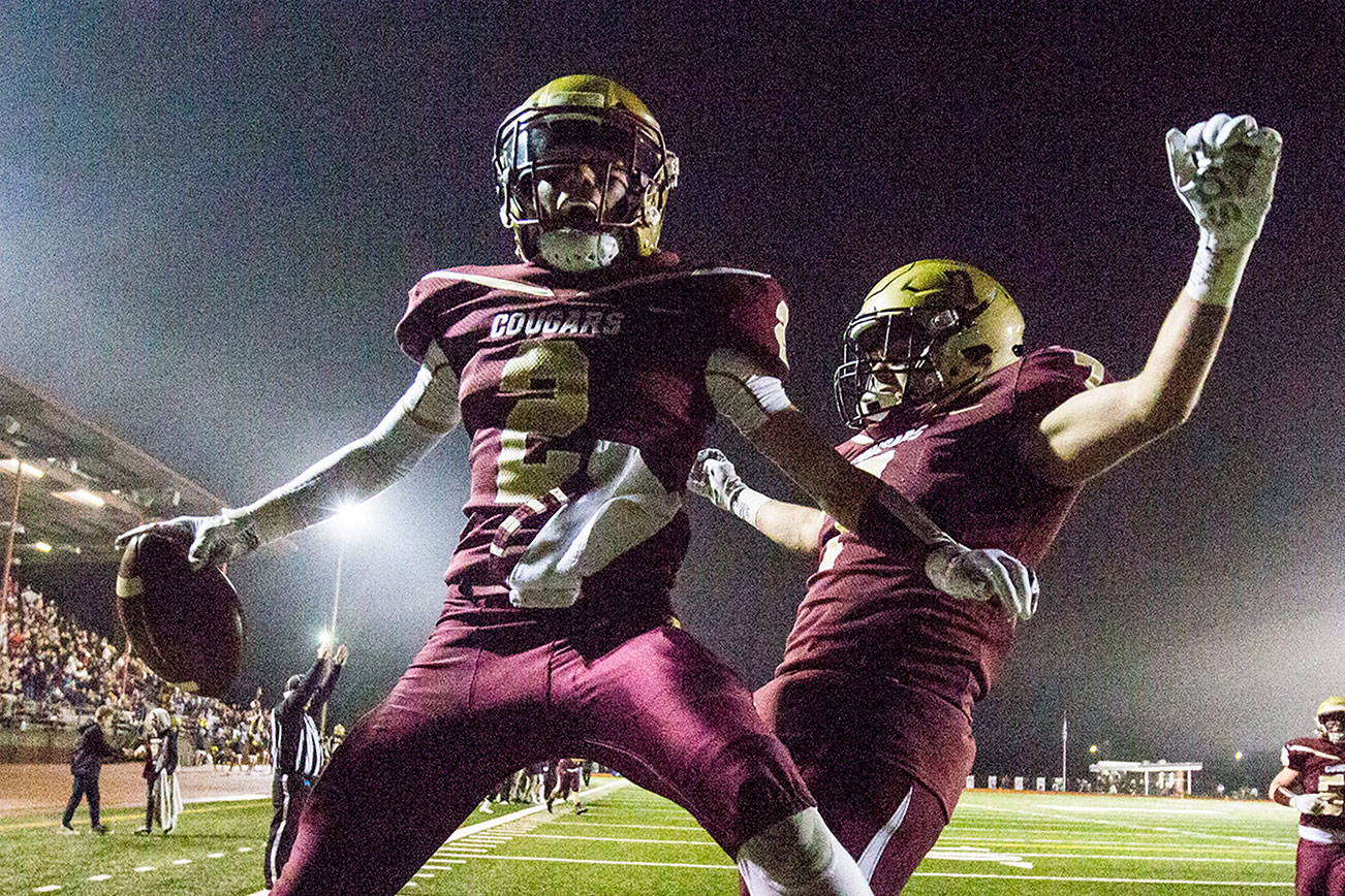 Lakewood’s Carson Chrisman celebrates after scoring a touchdown during a Class 2A state playoff game against Sequim last November. (Olivia Vanni / The Herald)