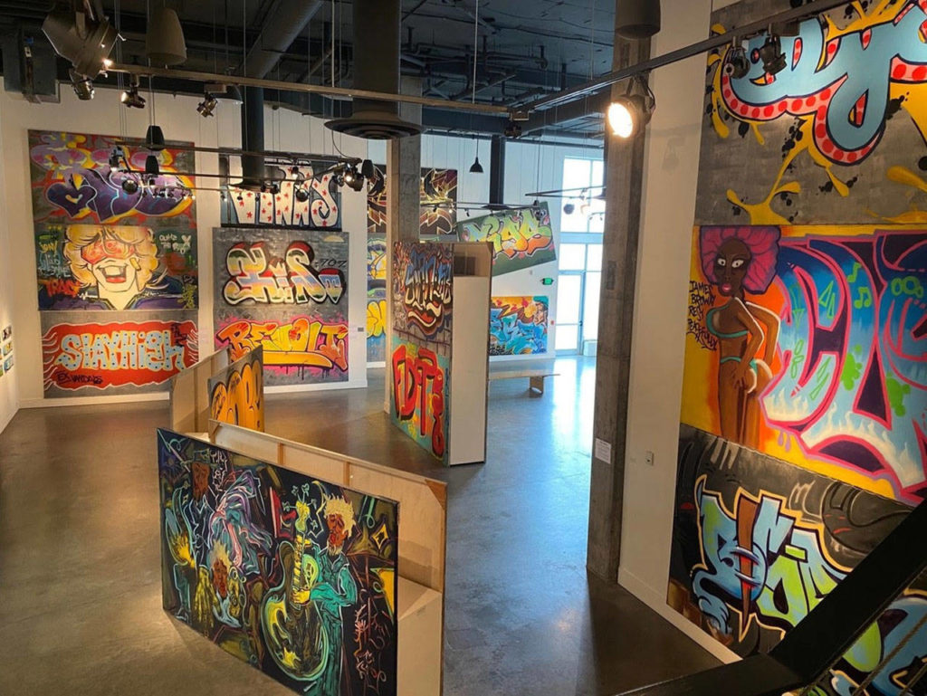 A view of the “American Graffiti” exhibit from the mezzanine gallery at the Schack Art Center.

