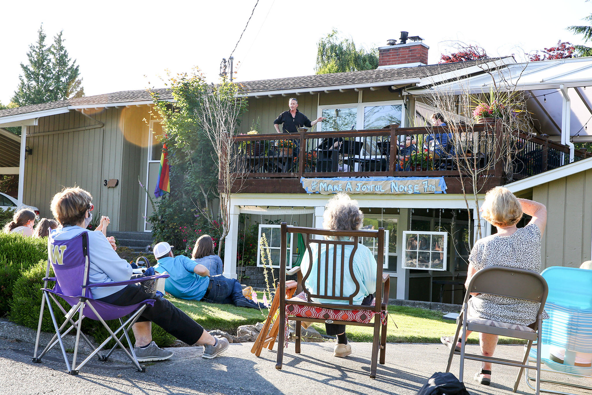 Jake Bergevin introduces musicians during the Thursday night concert in Everett on June 25, 2020. (Kevin Clark / The Herald)