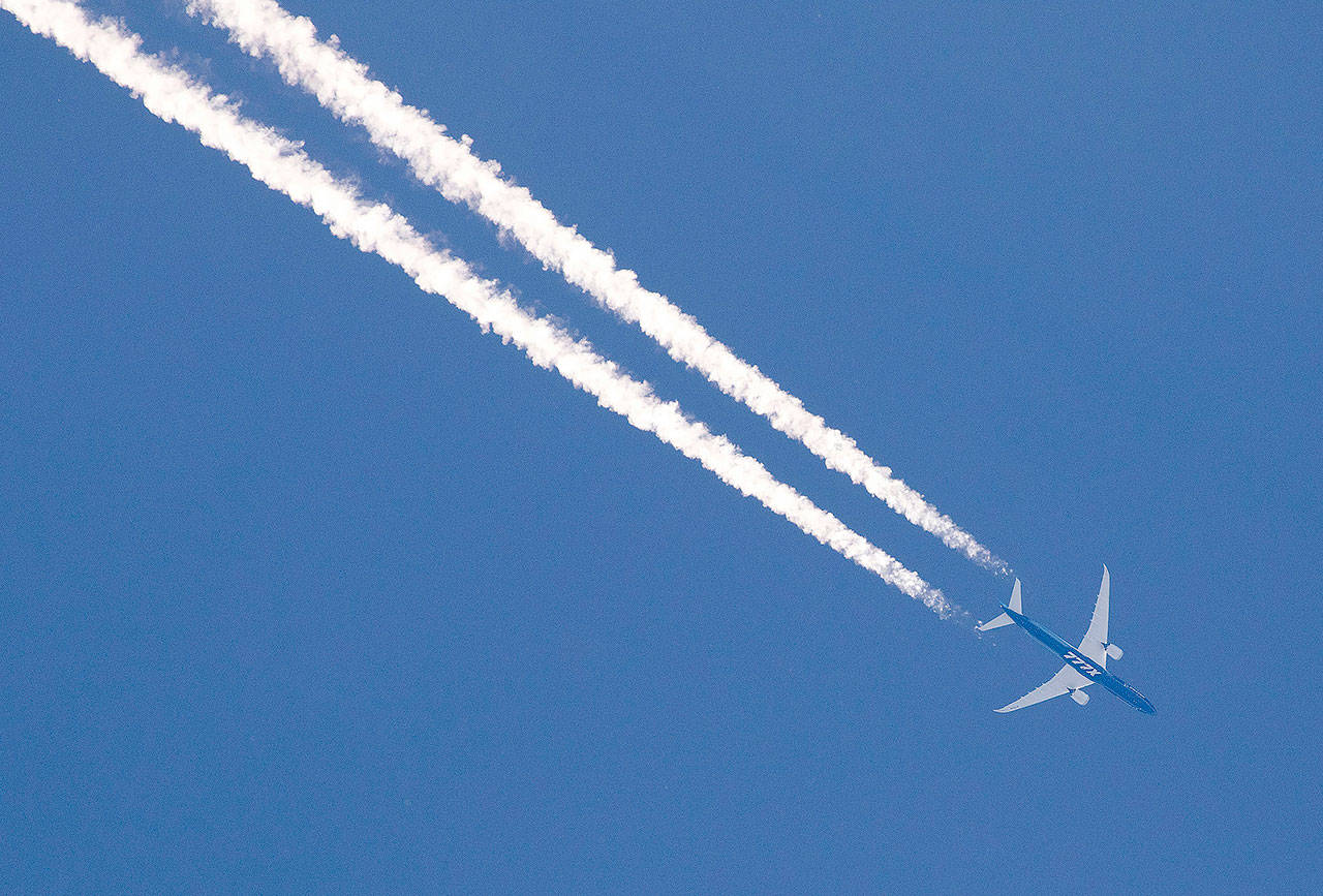 A Boeing 777X airplane flies over Moscow, Idaho during a test flight Tuesday. The new model of airplane had its first flight Thursday from Paine Field in Everett. (Geoff Crimmins/The Moscow-Pullman Daily News via AP)