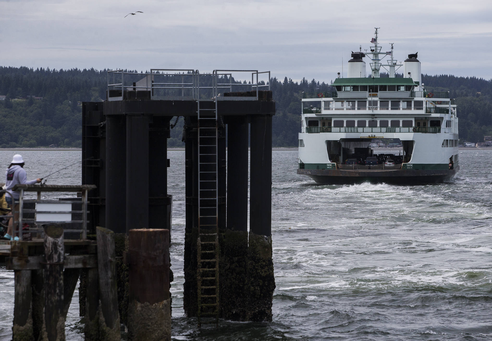 A ferry pulls away from the dock in Mukilteo last Friday. (Olivia Vanni / The Herald)