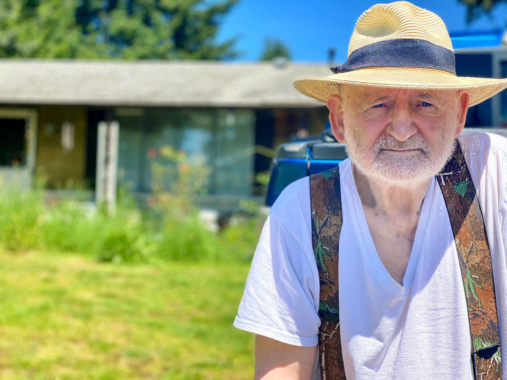 Andy Otter in front of his Marysville home that was in a 2019 episode of the A&E series “Hoarders” that was picked up by Netflix. His wife, Becky, did not want to be in a photo. (Andrea Brown / The Herald)
