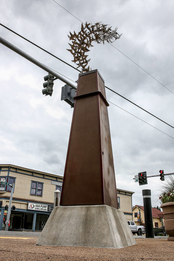 Kevin Pettelle’s “Wagner Swifts” sculpture stands at the corner of Main and Lewis streets in Monroe. (Kevin Clark / The Herald)
