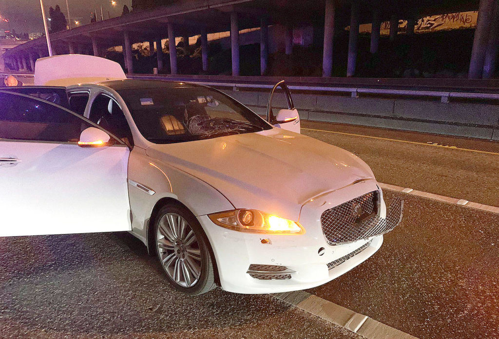 This photo provided by the Washington State Patrol shows the vehicle of Dawit Kelete, who is suspected of driving into a crowd of protesters on I-5 in Seattle early Saturday. (Washington State Patrol via AP) 

