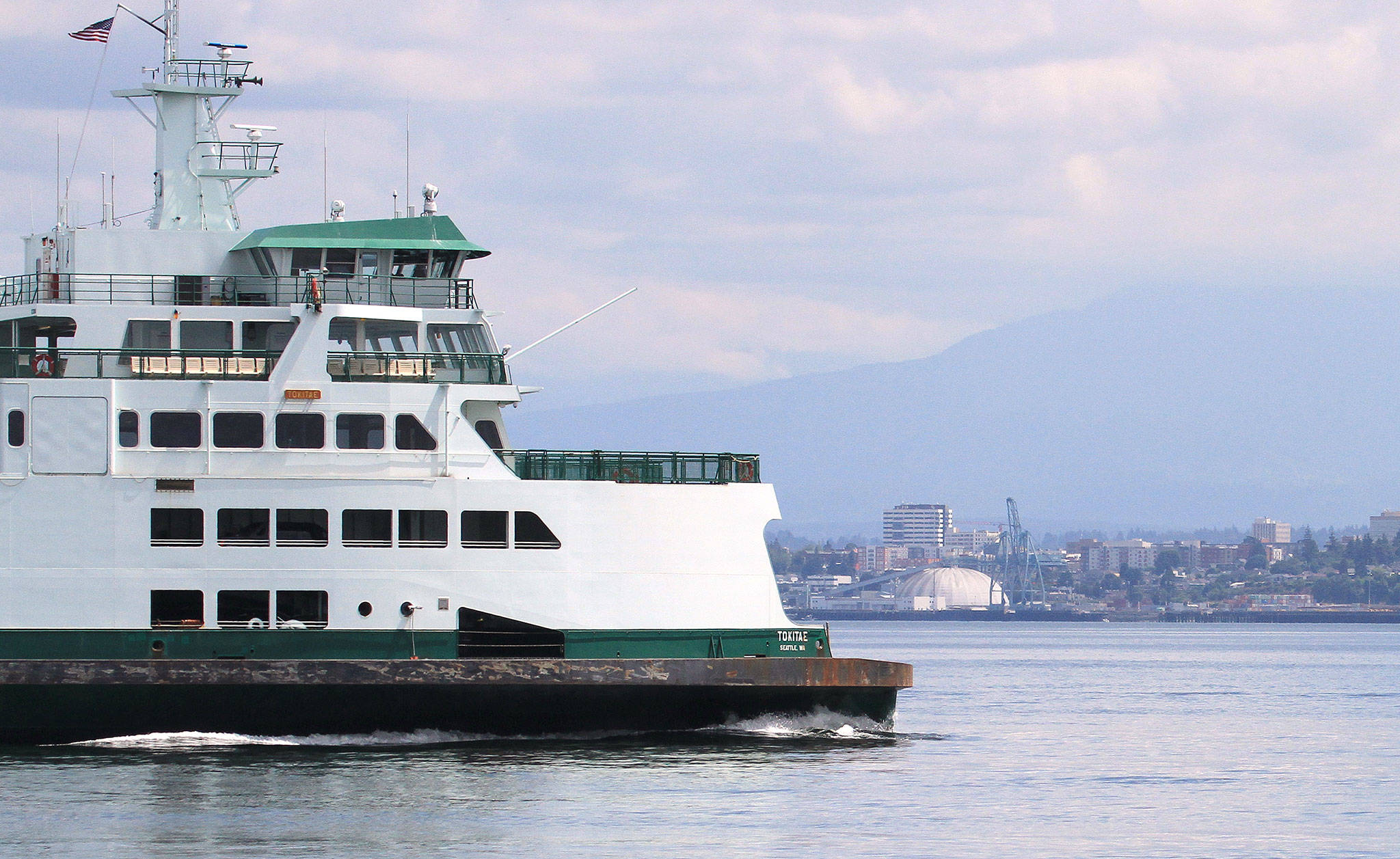 This photo shows the apparent moment of impact of Monday’s collision between the ferry Tokitae and a humpback whale that had just surfaced. (Bart Rulon)