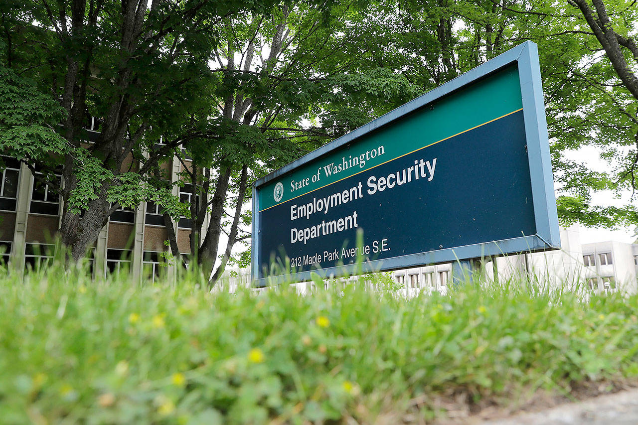 This photo shows a sign at the headquarters for Washington state’s Employment Security Department Tuesday, May 26, 2020, at the Capitol in Olympia, Wash. (AP Photo/Ted S. Warren)