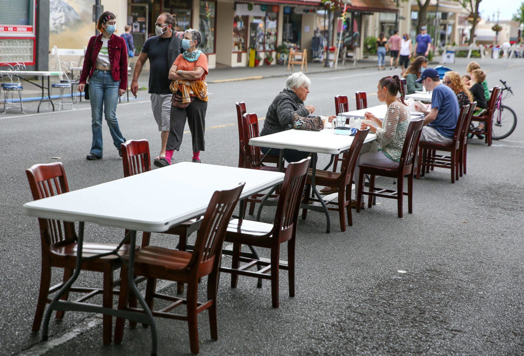 Edmonds is one of — if not the first — city in Snohomish County to shut down the streets of its commercial district to cars and trucks. (Kevin Clark / The Herald)
