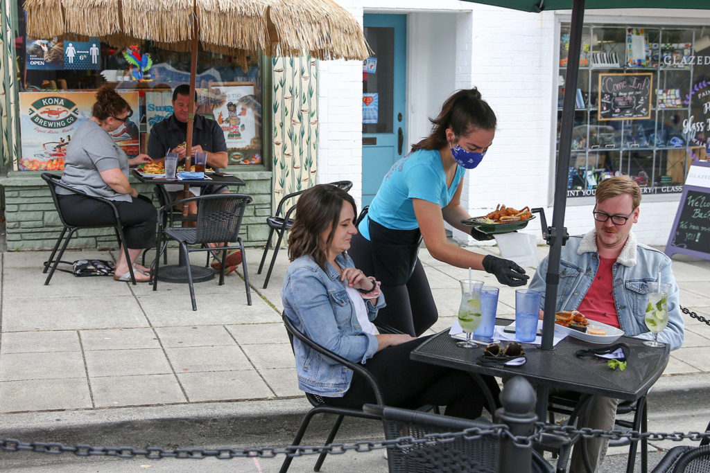 Open street initiatives, like the one in Edmonds, are becoming more popular for U.S. cities in recent months because of the COVID-19 pandemic. (Kevin Clark / The Herald)
