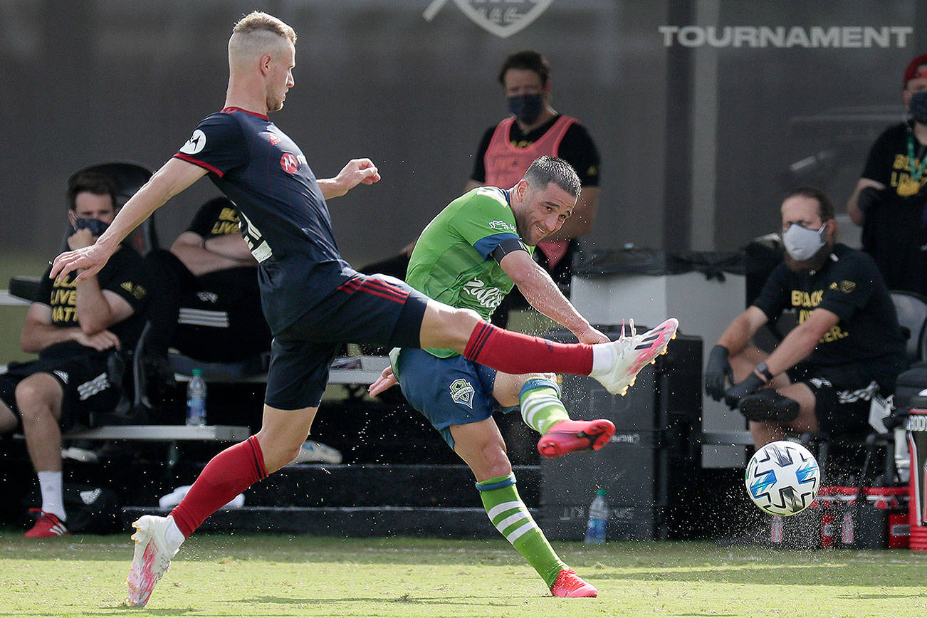 Sounders give up 2 late goals in loss to Fire