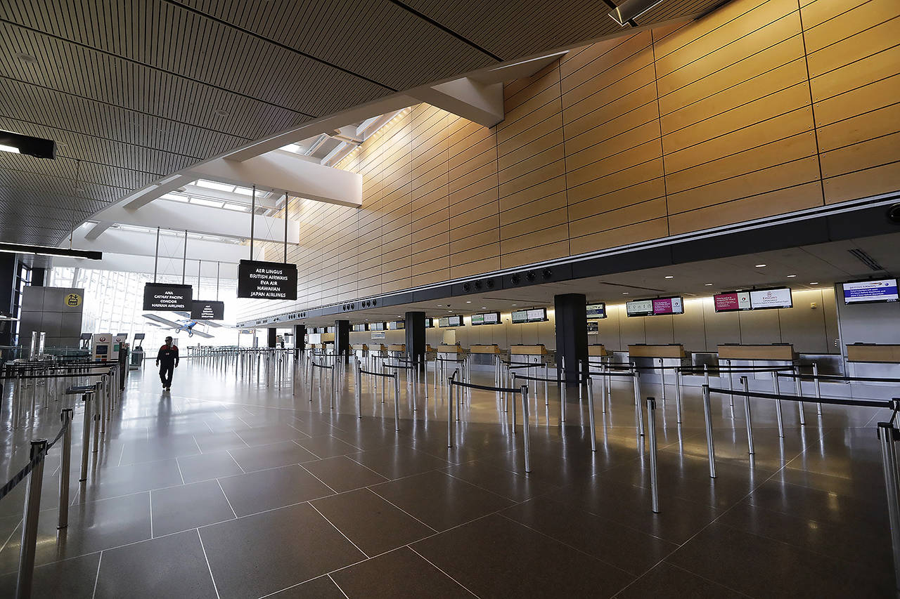 The Seattle-Tacoma International Airport on Wednesday, April 15, 2020, in SeaTac, Wash. (AP Photo/Elaine Thompson)