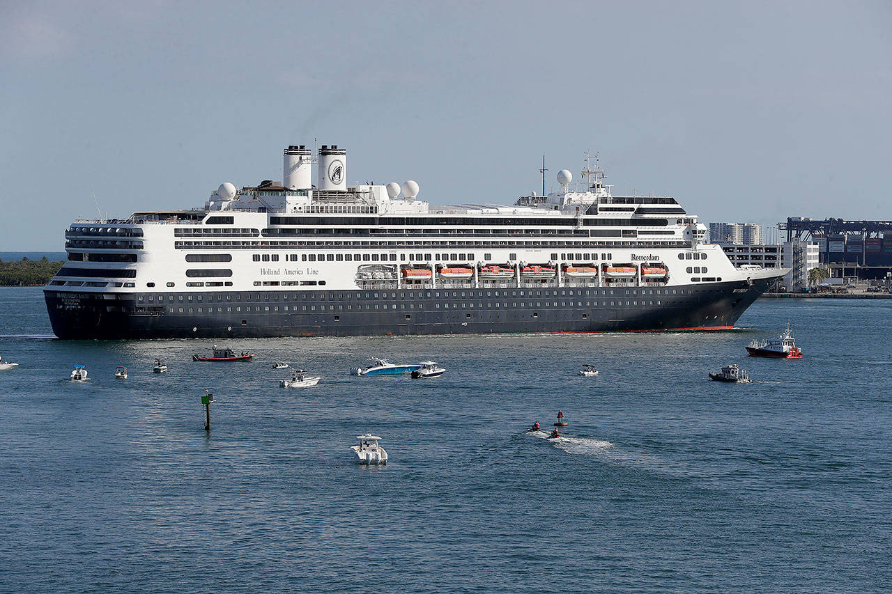 The cruise ship Rotterdam prepares to dock at Port Everglades in Fort Lauderdale, Florida, on April 2. Federal health officials are extending the U.S. ban on cruise ships through the end September as coronavirus infections rise in most U.S. states. (AP Photo/Wilfredo Lee, file)