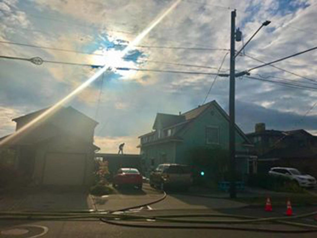 Firehoses in the street. (Courtesy of Mark Flynn)
