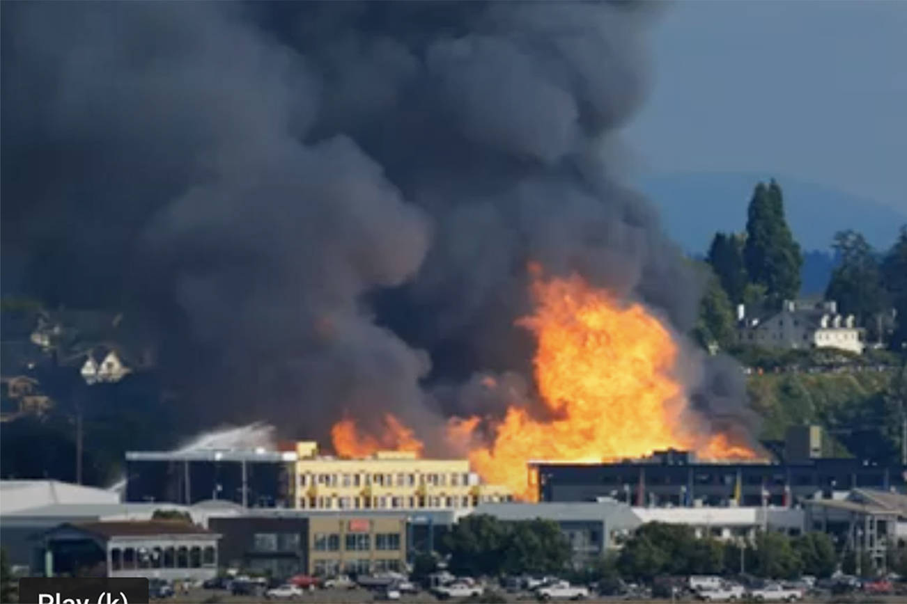 The under-construction Waterfront Place Apartments burn down