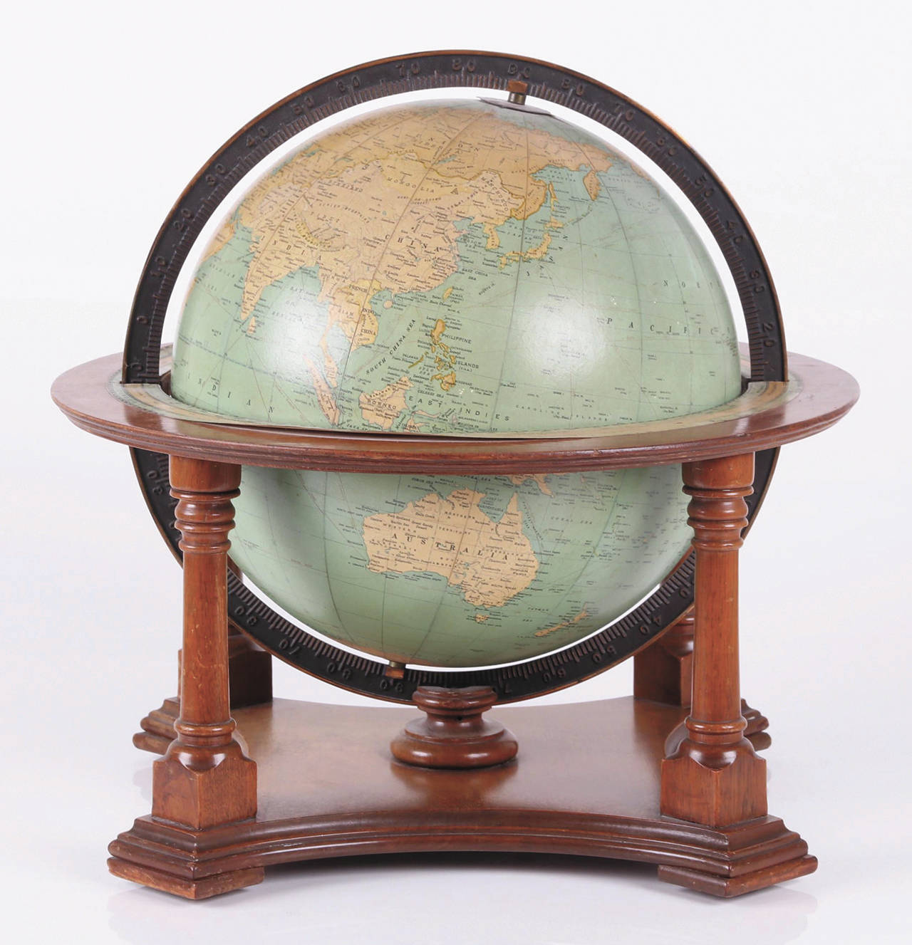 This terrestrial globe was made by Rand-McNally in the 1930s. The stand is made of mahogany. The 17-inch globe has a calibrated meridian and a paper horizon band. It sold at Locati Auctions for $154. (Cowles Syndicate Inc.)