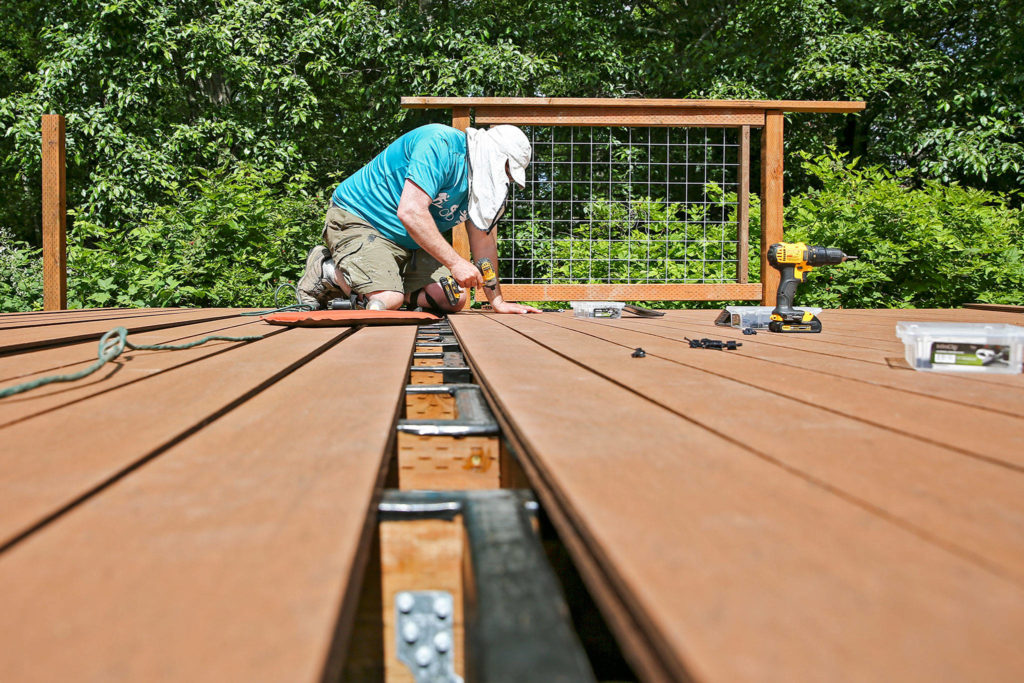 Rich Davis used Apollo composite decking instead of wood. (Kevin Clark / The Herald)
