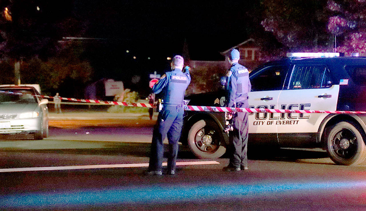 Everett police on May 25, 2019, at the scene on Grand Avenue where a woman was dragged and killed by a vehicle whose driver left the scene. (Everett Police Department)