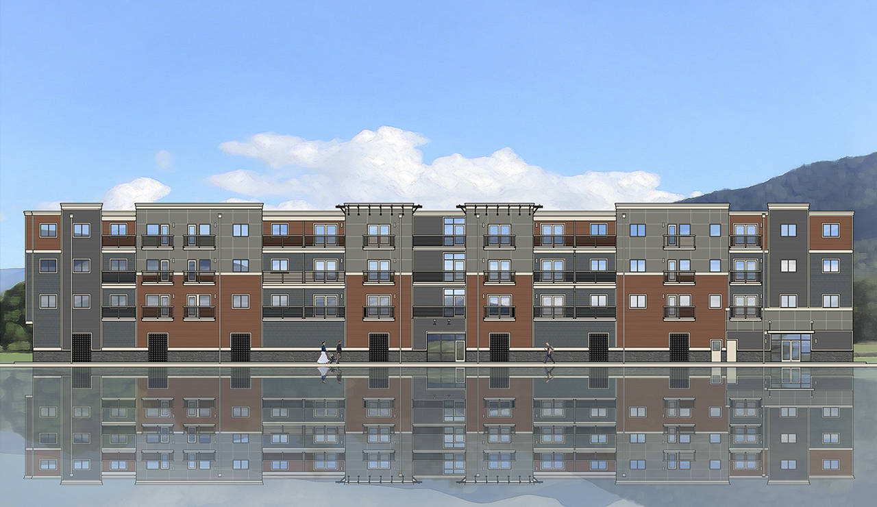 An artist’s rendering of housing with ground-floor businesses in the proposed 51st Avenue Urban Village project on 20 acres south of Arlington Municipal Airport, and within the Cascade Industrial Center.