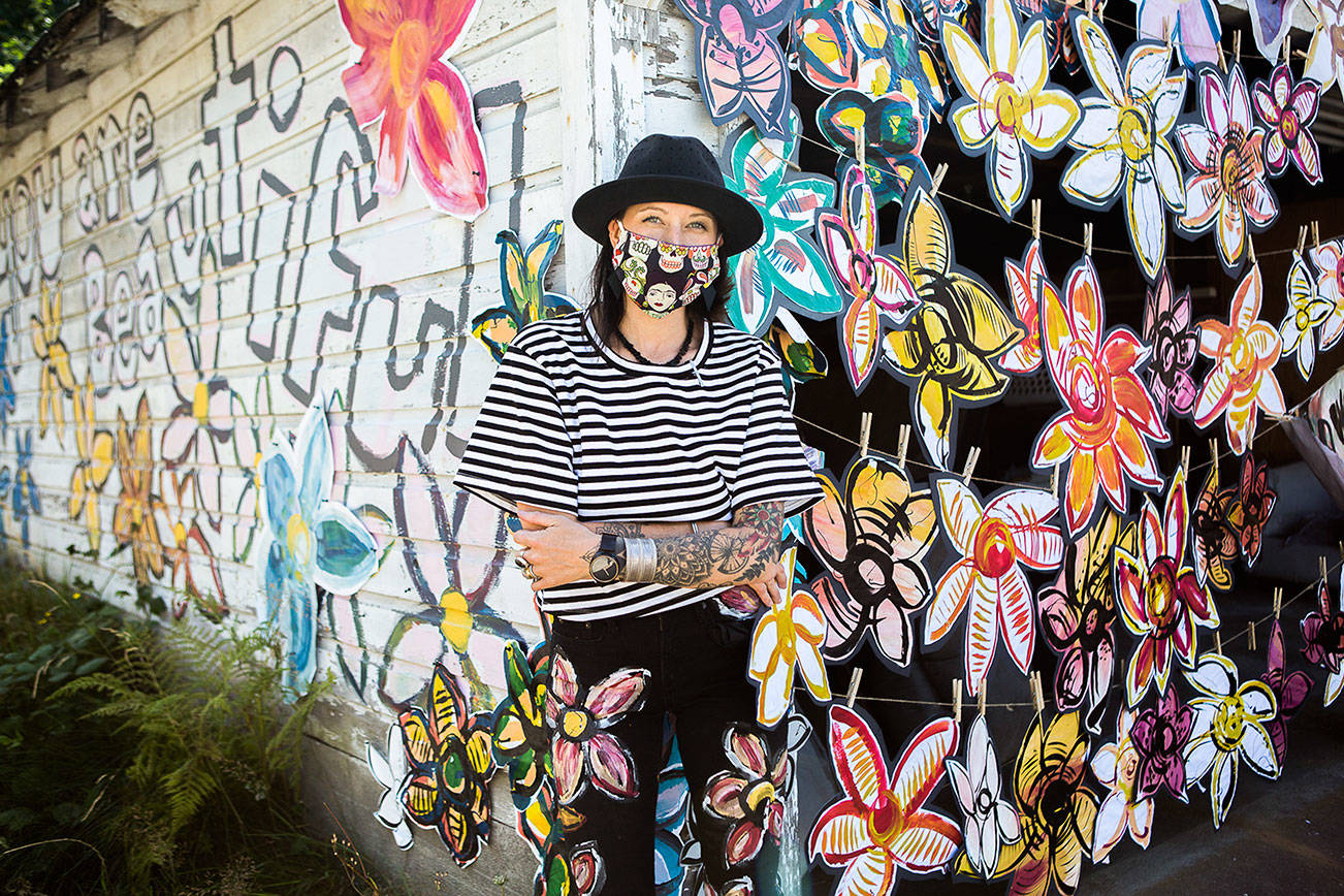 Lennon Wiltbank’s art adorns an abandoned, soon-to-be-demolished home and spreads joy in her neighborhood.