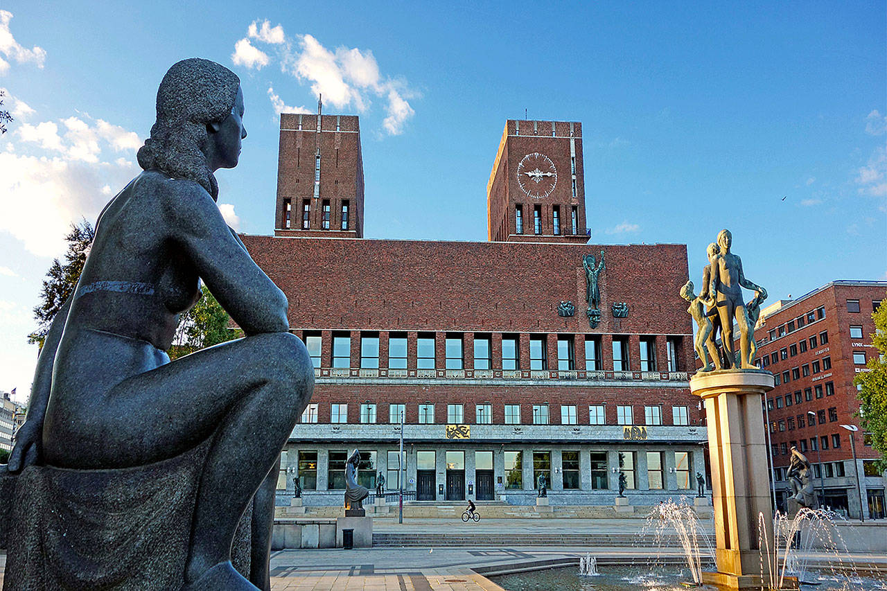Oslo’s City Hall is adorned with stirring murals and art that depict Norway’s history. (Rick Steves’ Europe)