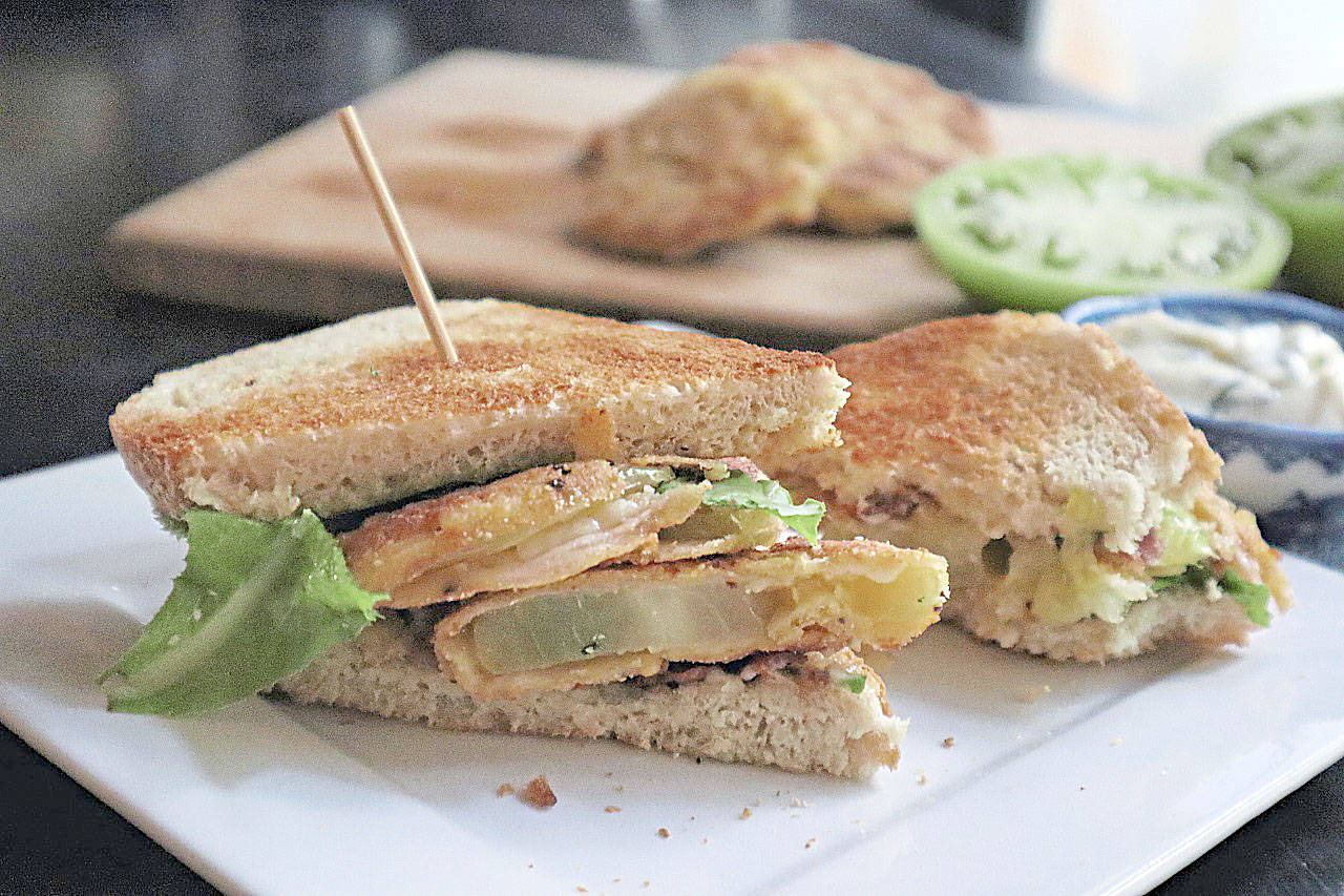 Fried green tomatoes stand in fro fresh red tomatoes in this BLT sandwich. (Gretchen McKay / Pittsburgh Post-Gazette)