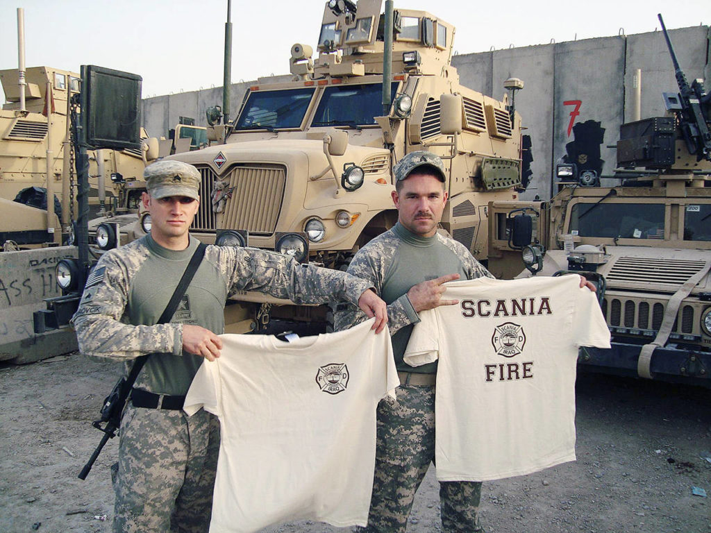 Sgt. Josh Jurovcik (left) with another soldier at Forward Operating Base Scania, south of Baghdad, in 2008 during his second tour of Iraq with the Army National Guard. (Photo courtesy of Josh Jurovcik)

