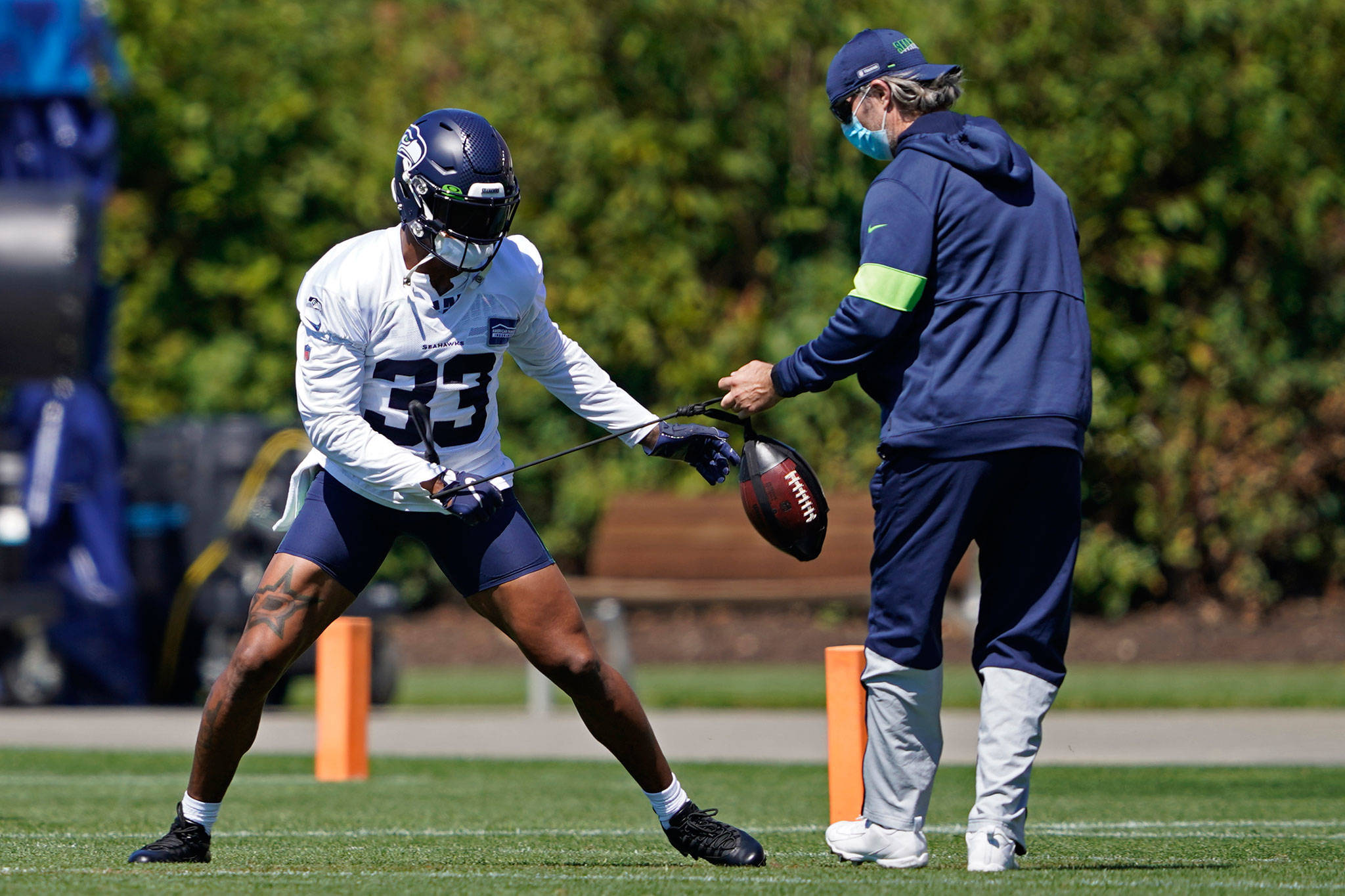 Seahawks safety Jamal Adams works with a coach during training camp Aug. 14, 2020, in Renton. (AP Photo/Ted S. Warren)