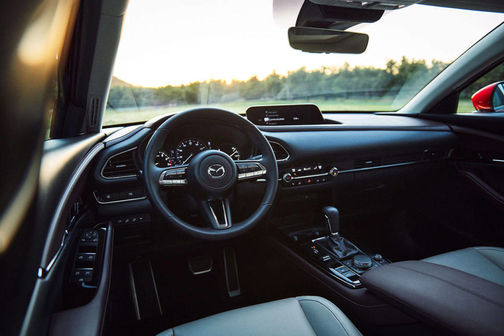 The 2020 Mazda CX-30’s infotainment system has an 8.8-inch display, recessed in the center dash. The Premium interior is shown here. (Manufacturer photo)
