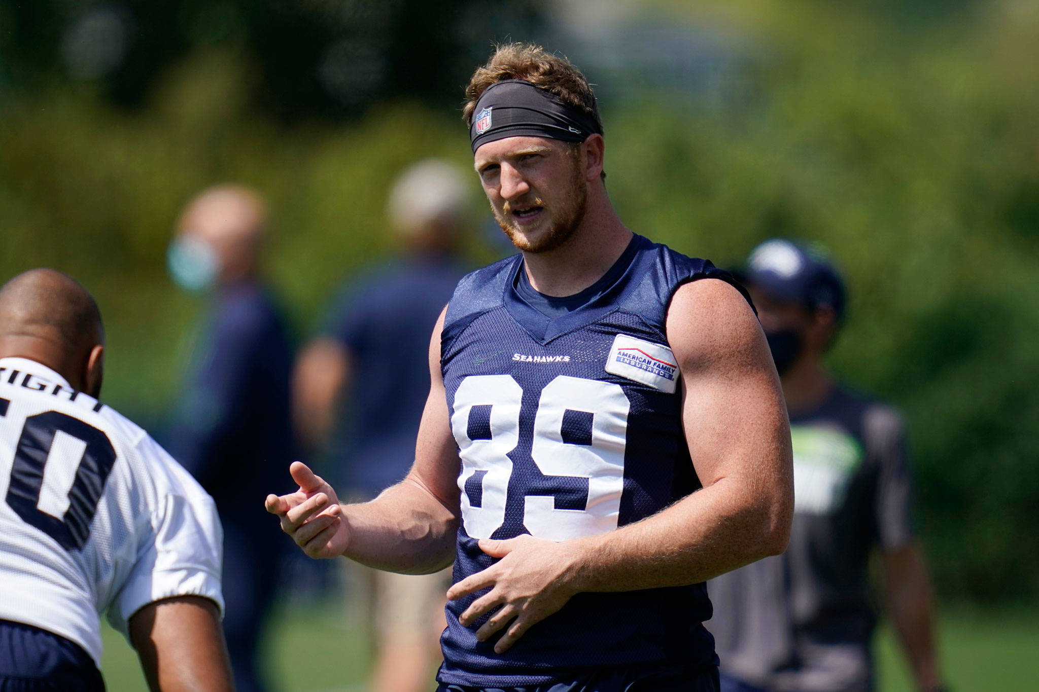 Seahawks tight end Will Dissly stands on the field during training camp on Aug. 13, 2020, at the Virginia Mason Athletic Center in Renton. (AP Photo/Elaine Thompson)