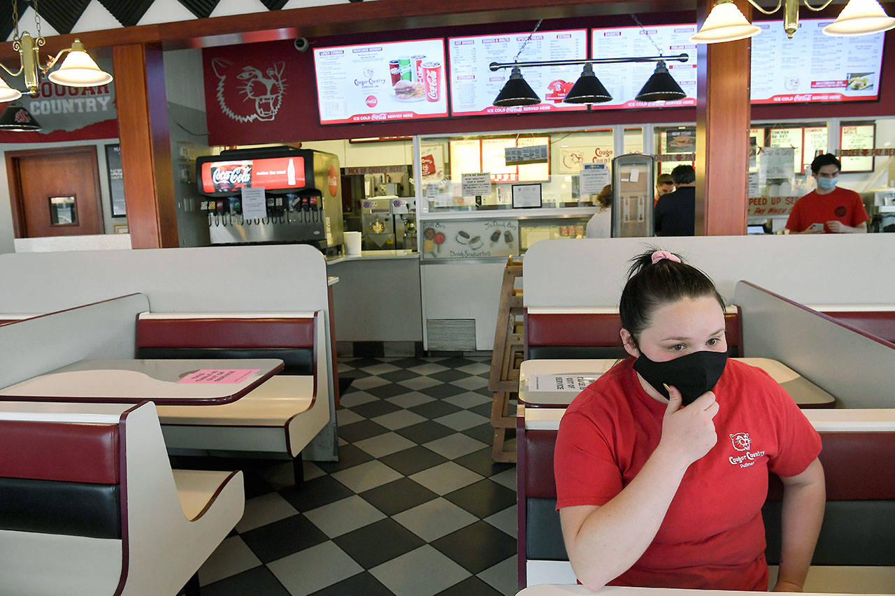 Llana Kish, manager of Cougar Country, pauses as she talks Aug. 13 about the effects of COVID-19 on the local economy near Pullman. (Tyler Tjomsland / The Spokesman-Review )