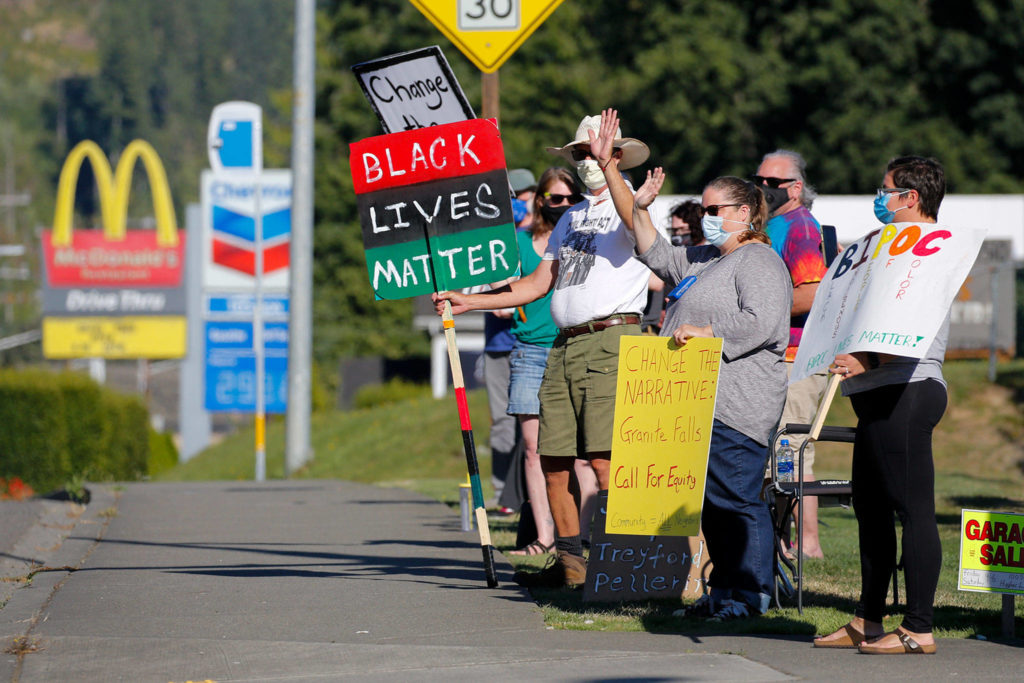 People gather during the Change the Narrative rally in Granite Falls Friday evening on August 28, 2020. (Kevin Clark / The Herald)
