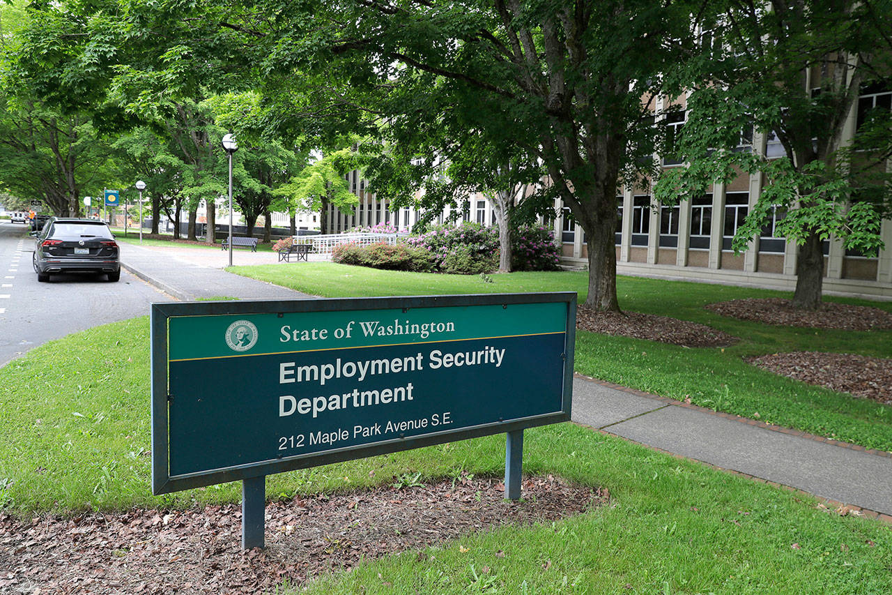 This photo shows a sign at the headquarters for Washington state’s Employment Security Department on May 26, 2020, in Olympia. (AP Photo/Ted S. Warren)