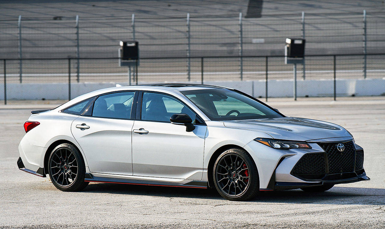A black aerodynamic body kit on the 2020 Toyota Avalon TRD includes a front splitter, side skirts, and rear diffuser. (Toyota)